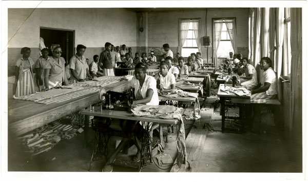 Female prisoners sewing