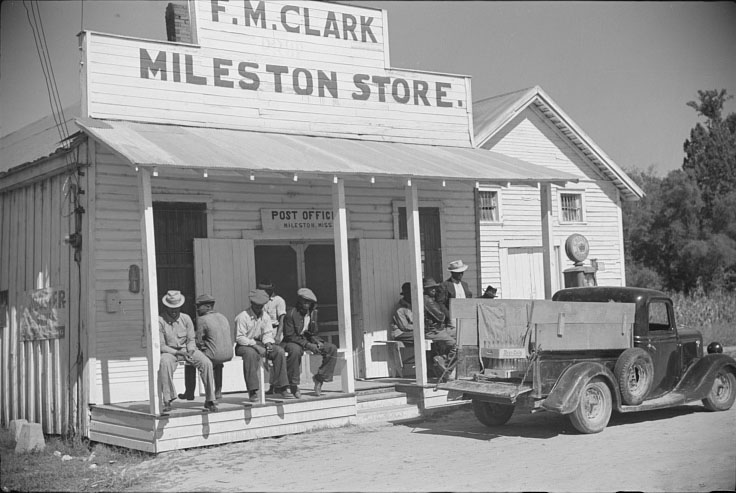 Tenants on the porch of plantation store