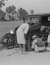 Repairing Tire on Road